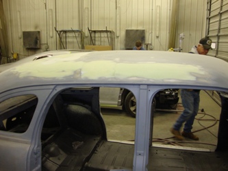 Final pre-paint prep work on the body is being completed.