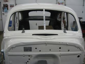 The windshield and firewall, looking inside the car.