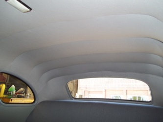 A view of the headliner and rear seat.