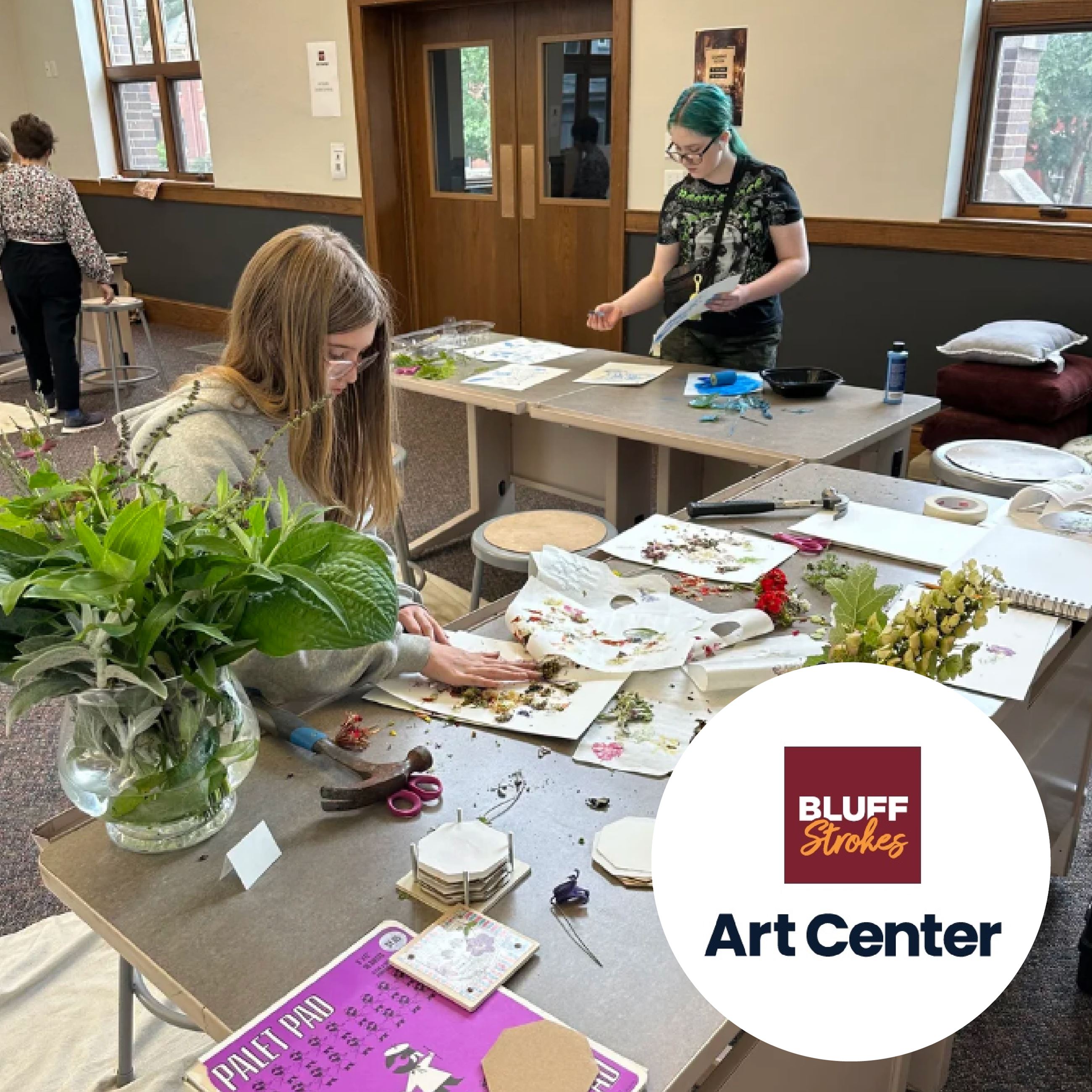 Two Teen Girls Doing Plant-Based Art at Tables